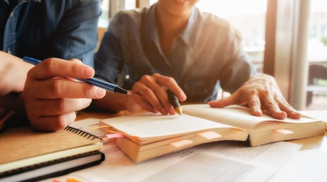 Education concept. Student studying and brainstorming campus con